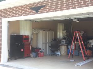 The “after” shot shows how  Sappari Solutions and BumbleJunk helped transform a messy garage into a more organized space in the 2014 contest.