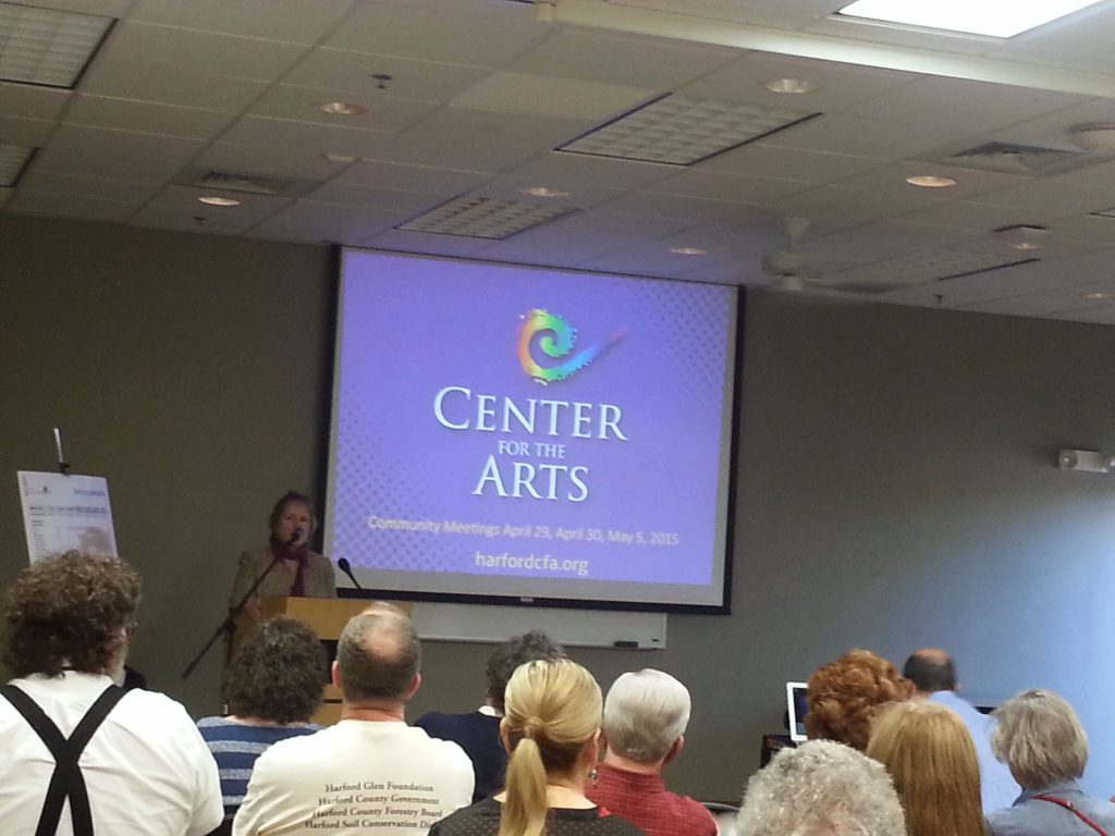 Center for the Arts CEO Kathy Smith leads the discussion on updates about the Center for the Arts during an April community meeting.