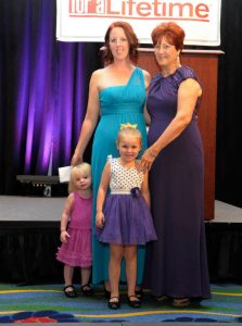 Jessica, a former client of Harford Family House, stands with her children and the organization’s executive director, Joyce Duffy, at the Bird’s Ball. Jessica shared the story of how Harford Family House changed her life in a video broadcast during the event.