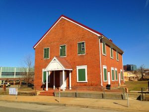 Participants on the Doors Open Baltimore tour October 24 can see the inside of the Quaker Meeting House, the oldest surviving house of worship in Baltimore that features a trapdoor, crawlspace, and hidden room.