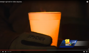 Candlelight vigil held for fallen heroes