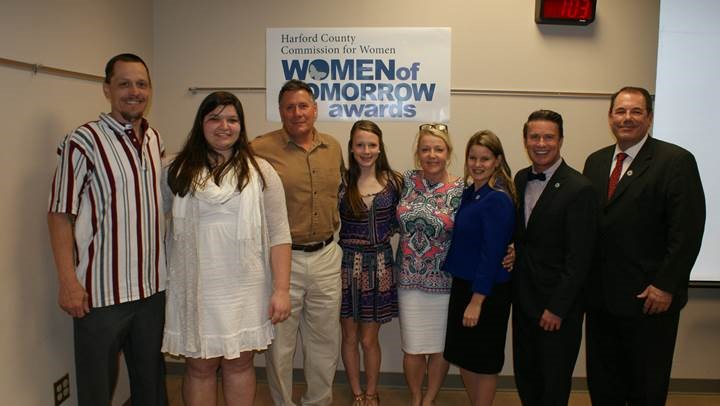 Pictured L-R:  Steven Moffett and his daughter Adaline Diaz, Women of Tomorrow winner in the 9-10 grade category; David McCollum, his daughter Sarah McCollum, nominee, and Sarah’s mother Debra McCollum; Director of Community Services Amber Shrodes; Harford County Executive Barry Glassman; and Director of Emergency Services Edward Hopkins. (Not pictured: Women of Tomorrow winner in the 11-12 grade category, Lucy Brooks, and nominee Sydney Biggs, who were unable to attend the ceremony)