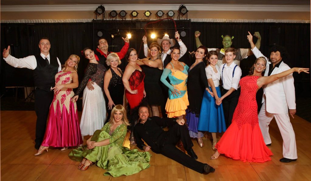 The “celebrity” dancers pose after their performance at the 2015 Dancing for the Arts Gala. Dance instructors Natasha Pollock and Tom Rzepnicki (seated in front) are working with a new group of citizens for this year’s show.