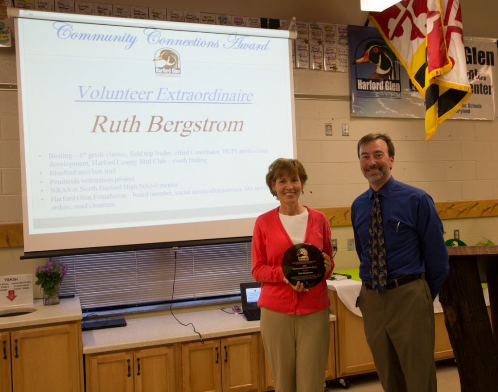Community Connections Award recipient Ruth Bergstrom and Howard Eakes, assistant supervisor of science.