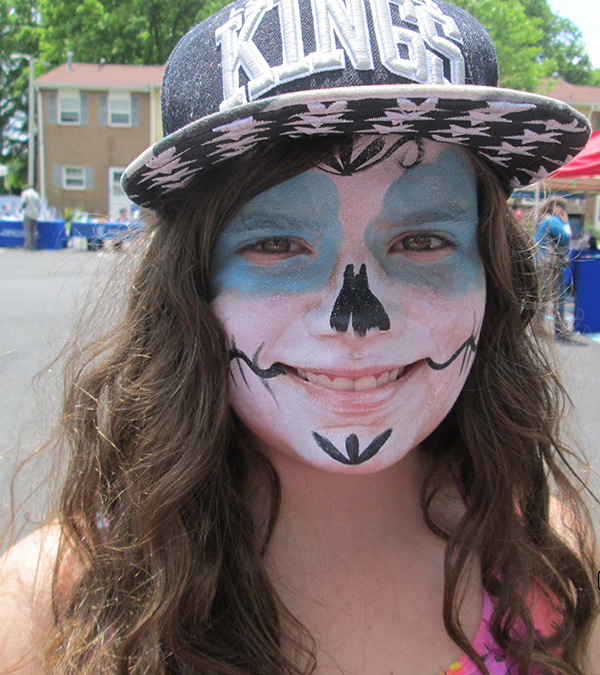 Facepainting is one of the many free or low-cost activities at the Summer Jam block party.