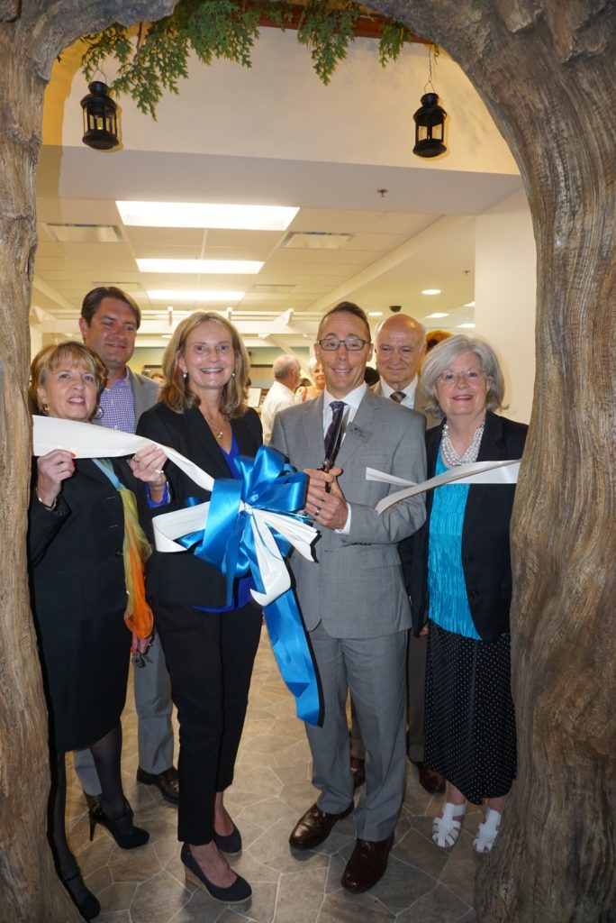 Mary Hastler, CEO of Harford County Public Library (center, left) and Alex M. Allman, chairperson of the Harford County Public Library board of trustees (center, right) participate in the September 1 ribbon cutting for the new Bel Air Library Children's Department with Bel Air Mayor Susan Burdette, Harford County Councilman Chad Shrodes, Bel Air Town Administrator Jesse Bane and Delegate Susan McComas. (Photo by Christine Sullivan)