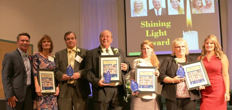 Pictured from left: County Executive Barry Glassman; Shining Light Award recipients Kim Hurd, Russ Hurd, Marvin Huntley, Wendy Messner and Denise Hanna; Director of Harford County Community Services Amber Shrodes.