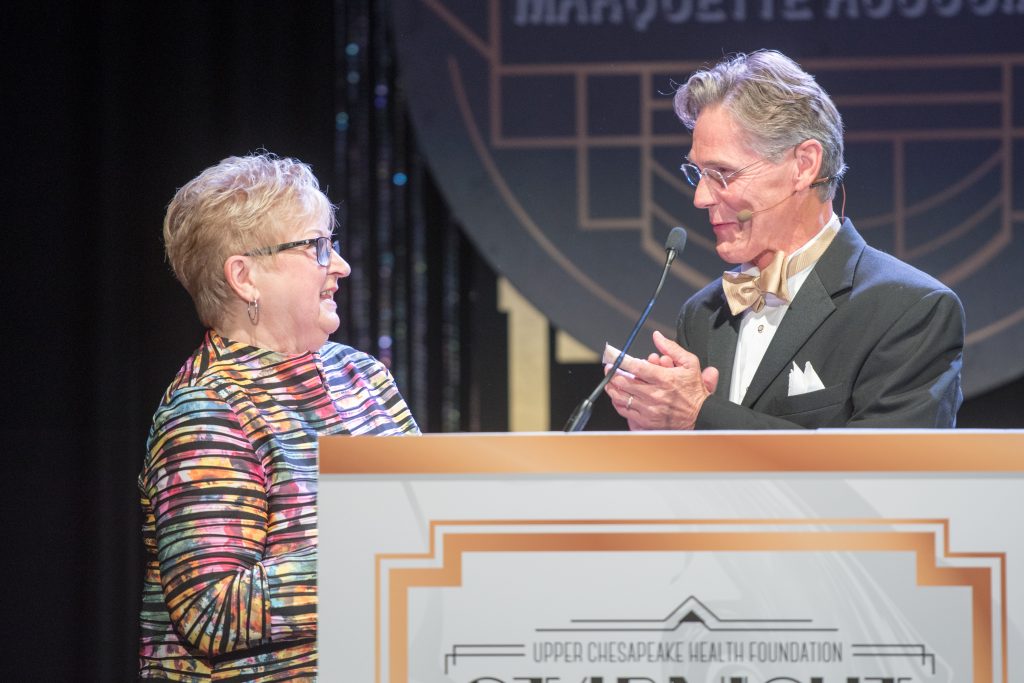 Lyle Sheldon, president/CEO of University of Maryland Upper Chesapeake Health, presents the inaugural Katherine (Kitty) Endslow Pickett Cura Personalis Award to Kitty Endslow Pickett at the 2016 Starnight Gala benefiting Cancer LifeNet at the Patricia D. and M. Scot Kaufman Cancer Center.  (Photo by Edwin Remsberg)