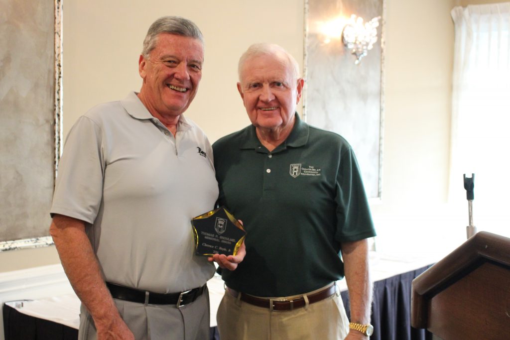 Bill Cox, president of The Greater Bel Air Community Foundation (right), presents the first Thomas P. Broumel Memorial Award to Chuck Boyle, dealer and president of Boyle Buick GMC, at the foundation's 15th Annual Golf Classic October 17 at Maryland Golf and Country Club. (Photo Courtesy of Mary Hastler)